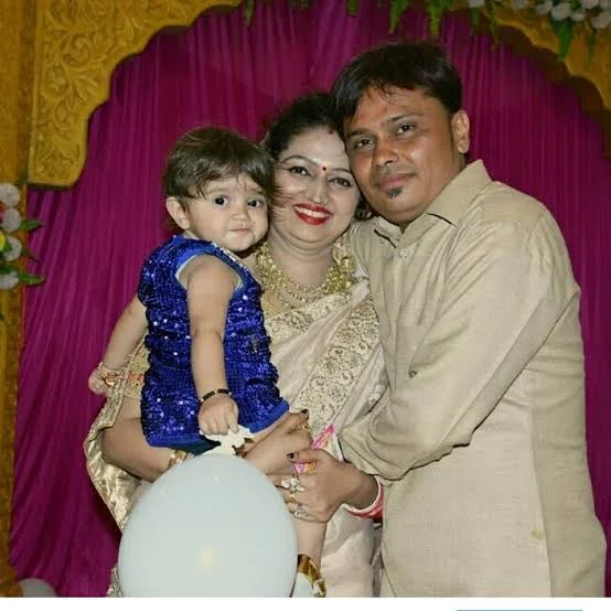 Neha Ashish Tiwari with her husband Ashish and daughter